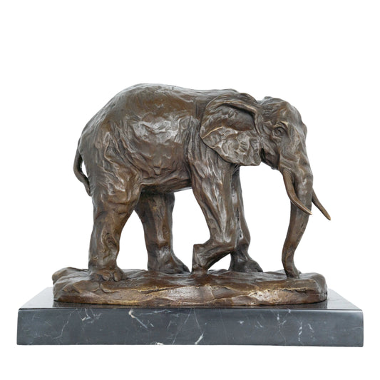 Realistic African elephant bronze sculpture with detailed texture and rich patina. A timeless wildlife statue symbolizing strength, wisdom, and prosperity.