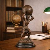 Powerful bronze Atlas sculpture holding celestial sphere with star charts, Greek Titan god statue on tiered circular dark marble base, loss wax casting mythological art.