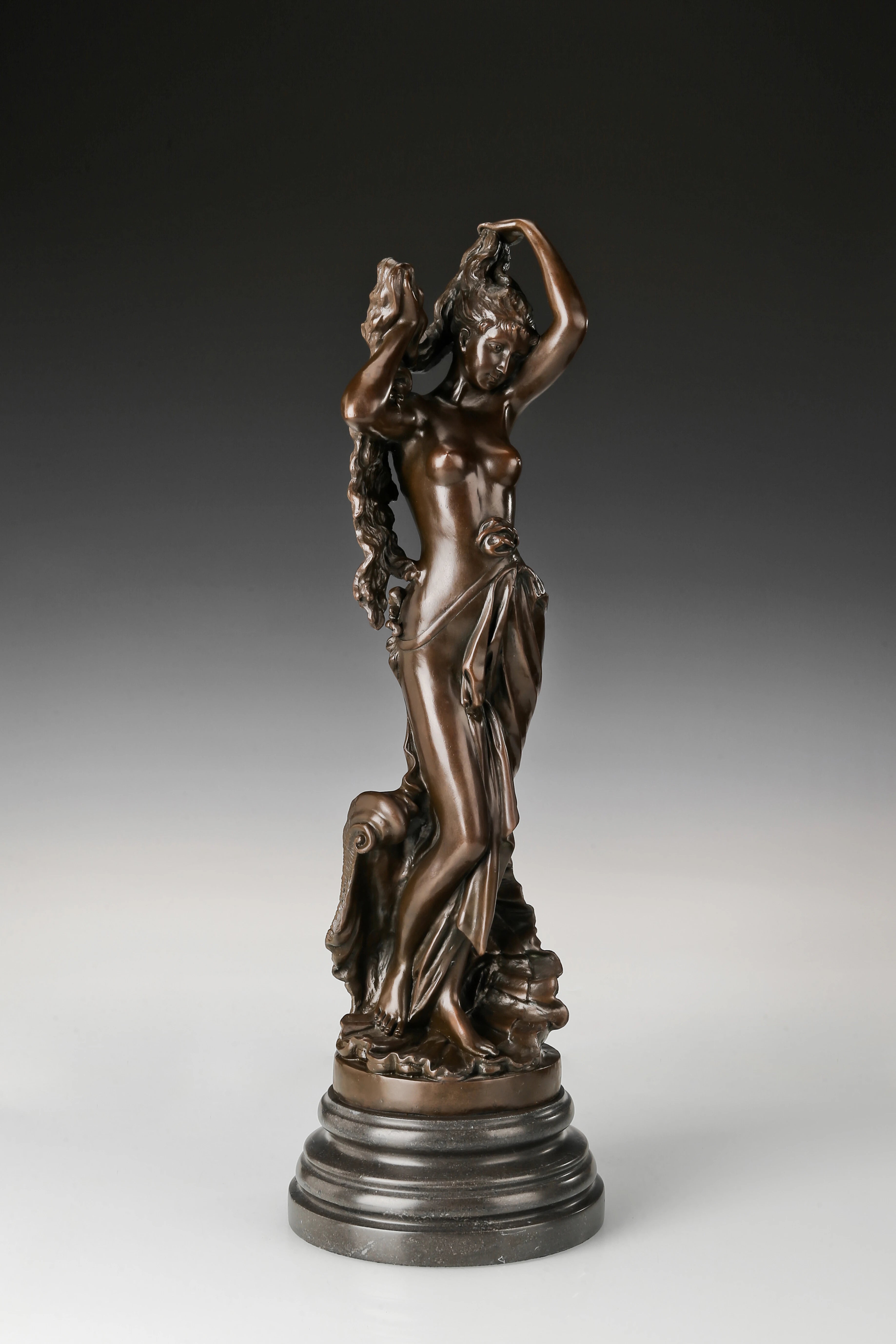 Angled view of Birth of Venus bronze statue showing graceful pose and detailed drapery