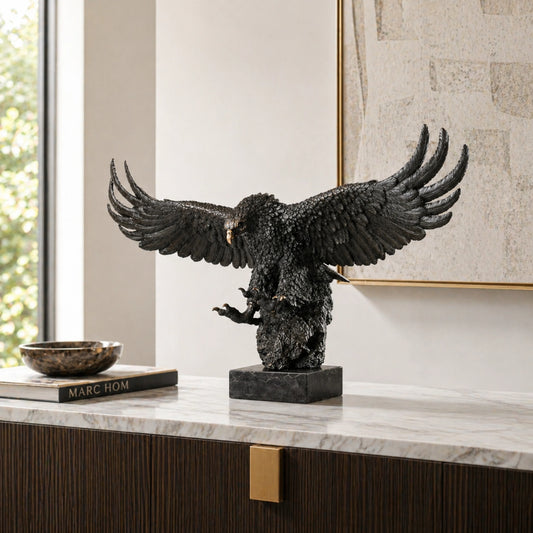 Majestic bald eagle bronze statue with wings spread and talons extended. A powerful wildlife statue symbolizing freedom, strength, and leadership.