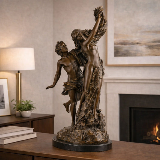 Dramatic bronze Cupid and Psyche sculpture in tender embrace, mythological love and soul statue on oval black marble base, loss wax casting romantic fine art.