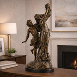Dramatic bronze Cupid and Psyche sculpture in tender embrace, mythological love and soul statue on oval black marble base, loss wax casting romantic fine art.