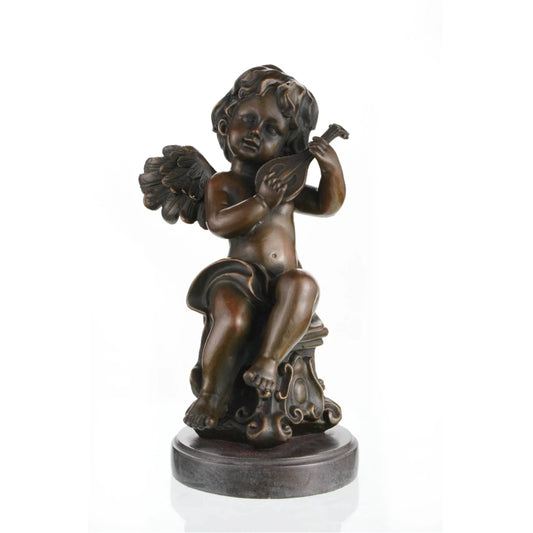 Charming bronze cherub sculpture playing mandolin, seated putto with lute on scroll-carved pedestal, loss wax casting musical art on dark marble base.