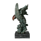 Abstract bronze eagle head sculpture with striking verdigris patina and marble base. A bold wildlife statue symbolizing freedom, strength, and vision.