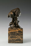 Pre-flight bronze eagle sculpture with detailed feathers and natural base. Elegant wildlife statue for home decor, office, or collectors.
