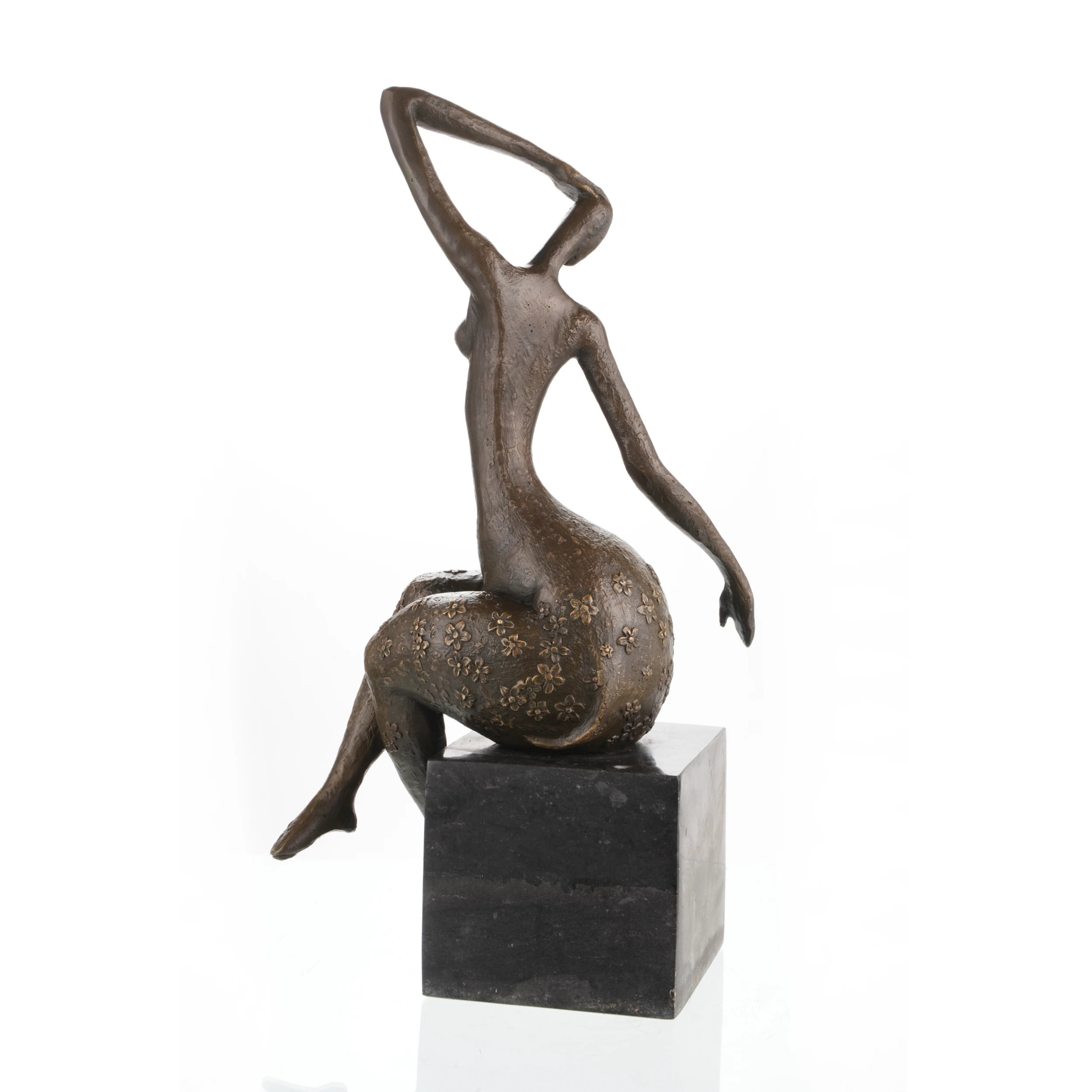 Elegant abstract bronze sculpture of seated female figure with raised arm