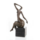Elegant abstract bronze sculpture of seated female figure with raised arm