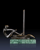 Handcrafted abstract bronze sailing sculpture with stylized sailor and modern sailboat design