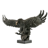Majestic bald eagle bronze sculpture with wings spread and talons extended. A powerful wildlife statue symbolizing freedom, strength, and leadership.