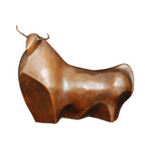 Minimalist abstract bronze bull sculpture with smooth geometric form, symbolizing calm strength, stability, and prosperity. Ideal for modern interiors.