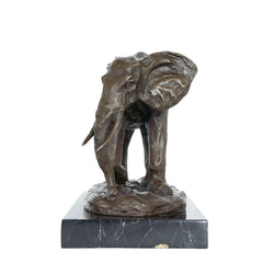 This realistic bronze sculpture portrays the majestic presence of an African elephant, carefully crafted using the traditional lost-wax casting technique.