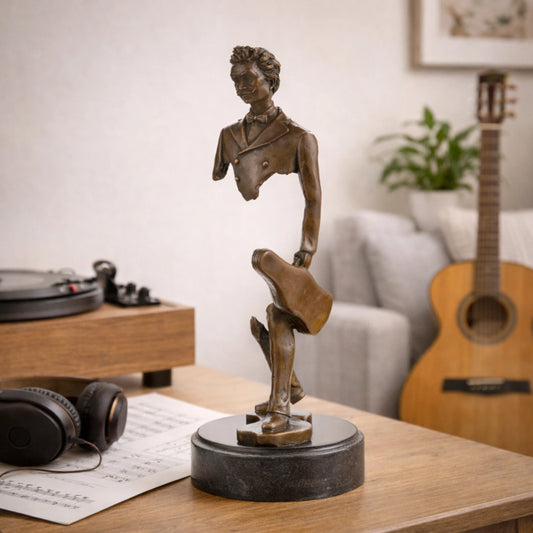 Surrealist bronze violinist sculpture with floating torso in Salvador Dalí style, fragmented musician statue in tuxedo on round black marble base, loss wax casting modern art.