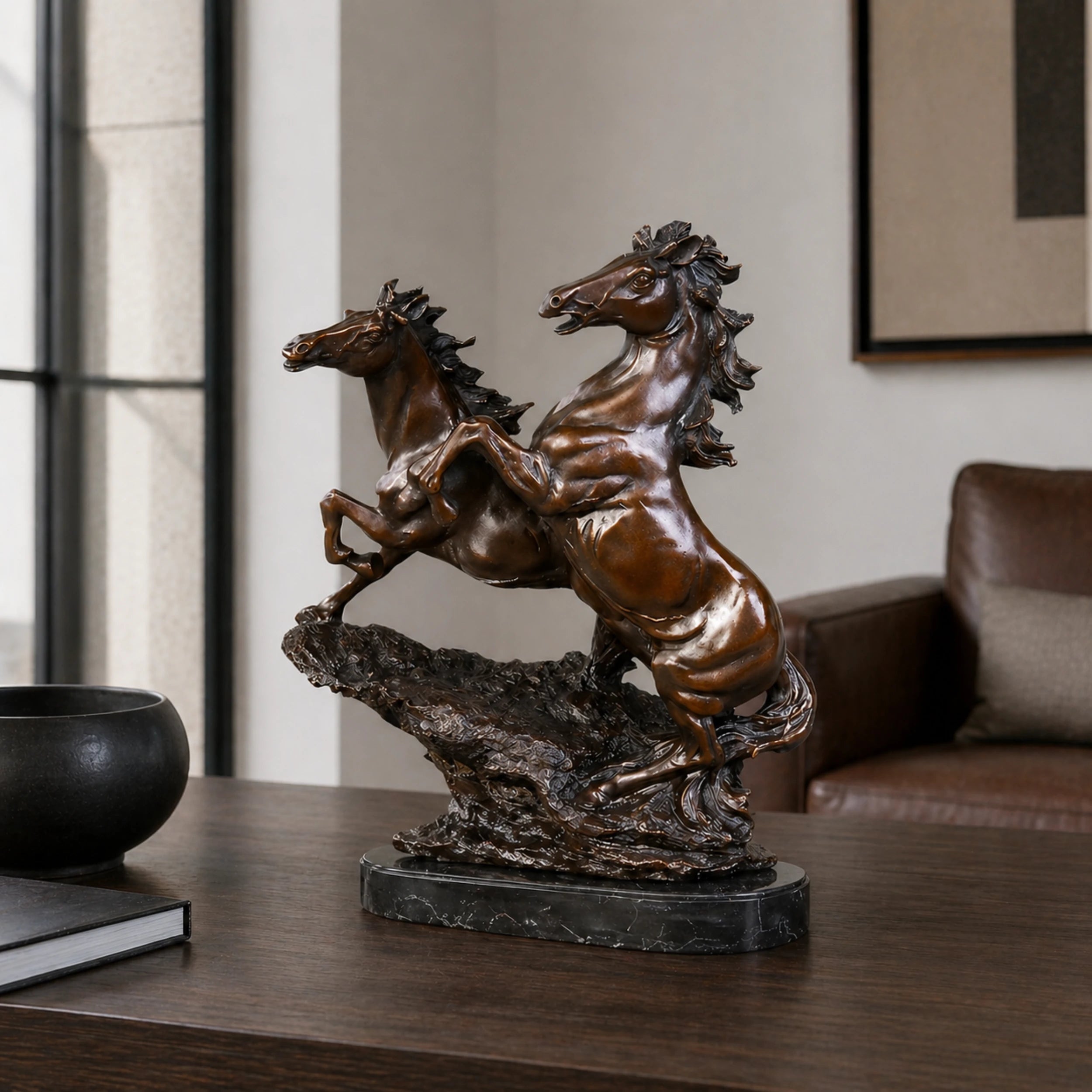 Dynamic bronze sculpture of two rearing horses in synchronized motion, realistic dual stallion statue on veined black marble base, loss wax casting fine art.