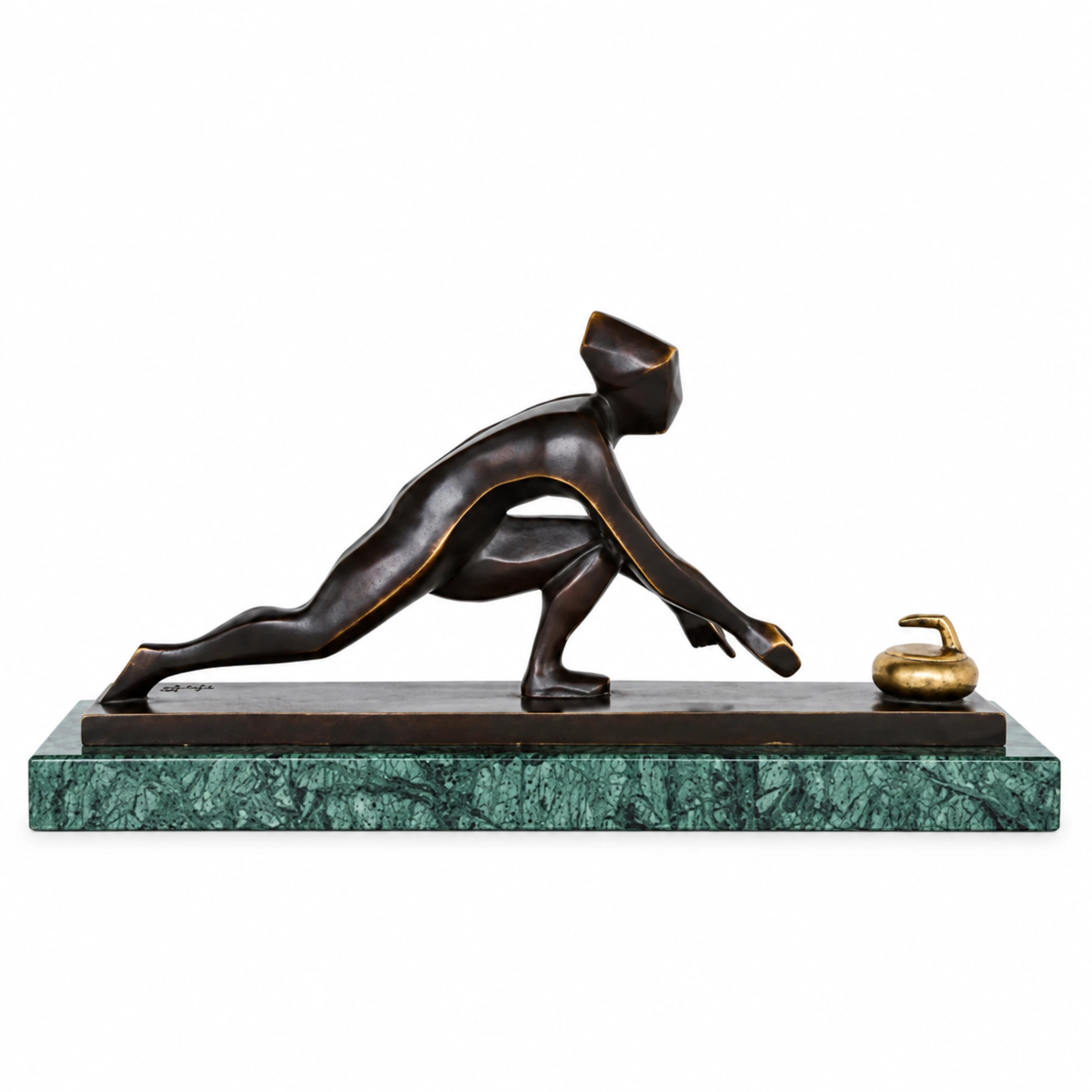 Handcrafted abstract bronze curling player sculpture in a low sliding pose reaching toward a curling stone
