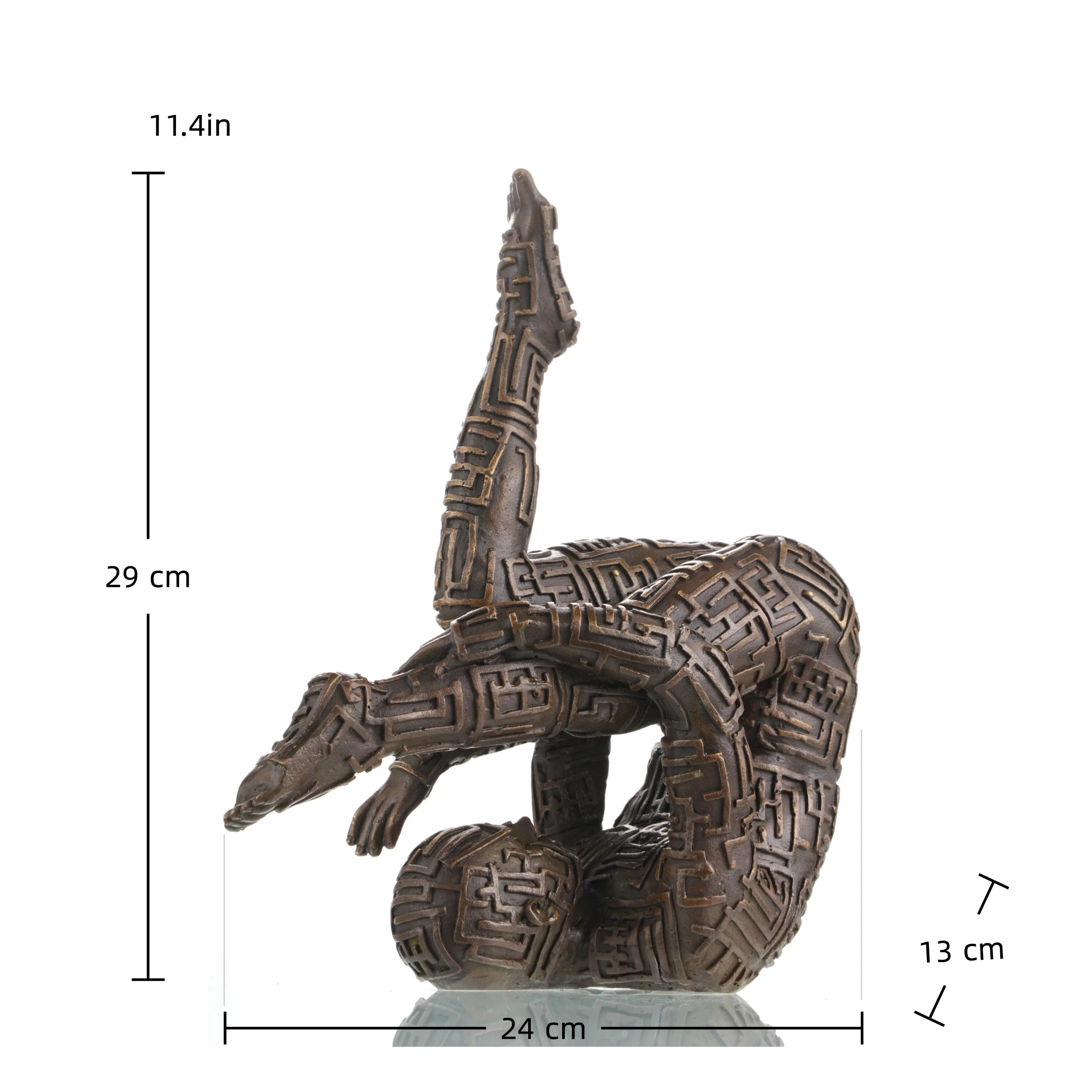 Abstract bronze statue of contorted human figure with maze pattern