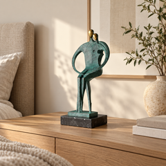 Devoted Couple bronze sculpture displayed to scale in a refined modern interior