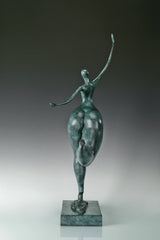 Back view of abstract dancing woman bronze sculpture showing its sculpted silhouette