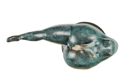 Top view of abstract female gymnast bronze sculpture showing its extended leg and curved pose