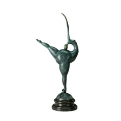 Abstract female gymnast bronze sculpture balancing on one leg with an extended leg and raised arms