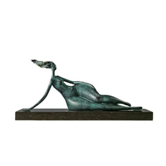 Abstract reclining woman bronze sculpture with green patina and rectangular base on white background
