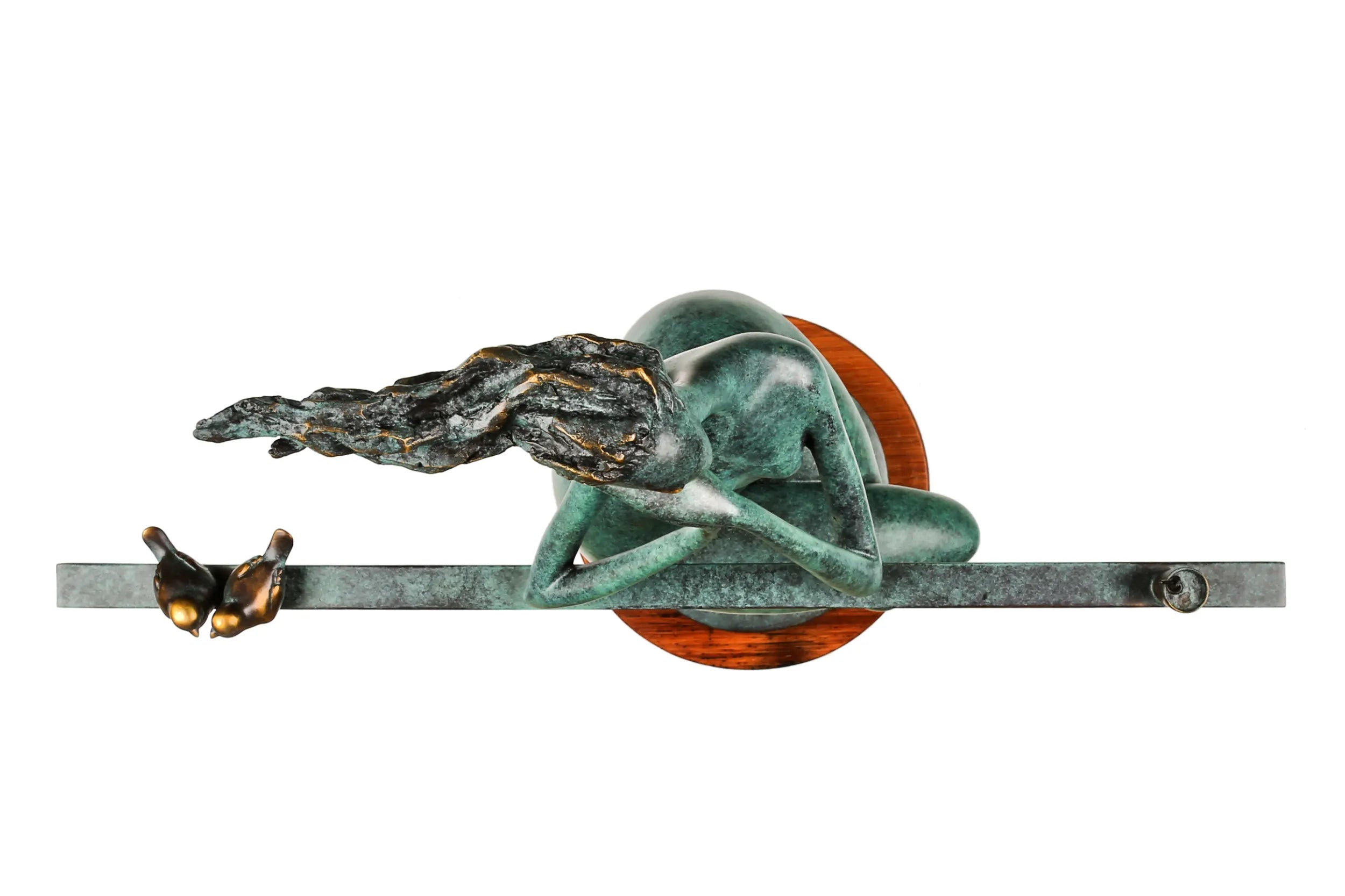Top view of the abstract seated woman sculpture showing the horizontal bar, birds and wooden base