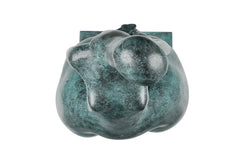 Overhead view of the abstract woman bronze figure showing the head and curved body