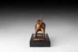 Back view of handcrafted abstract walking cat bronze sculpture