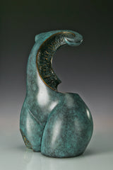 Three-quarter view of abstract woman torso bronze statue showing its curved upper form