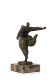 Modern dancing figure bronze statue with rounded abstract form on marble base, contemporary home decor