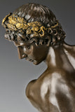 Close-up of Apollo bronze statue with laurel wreath crown