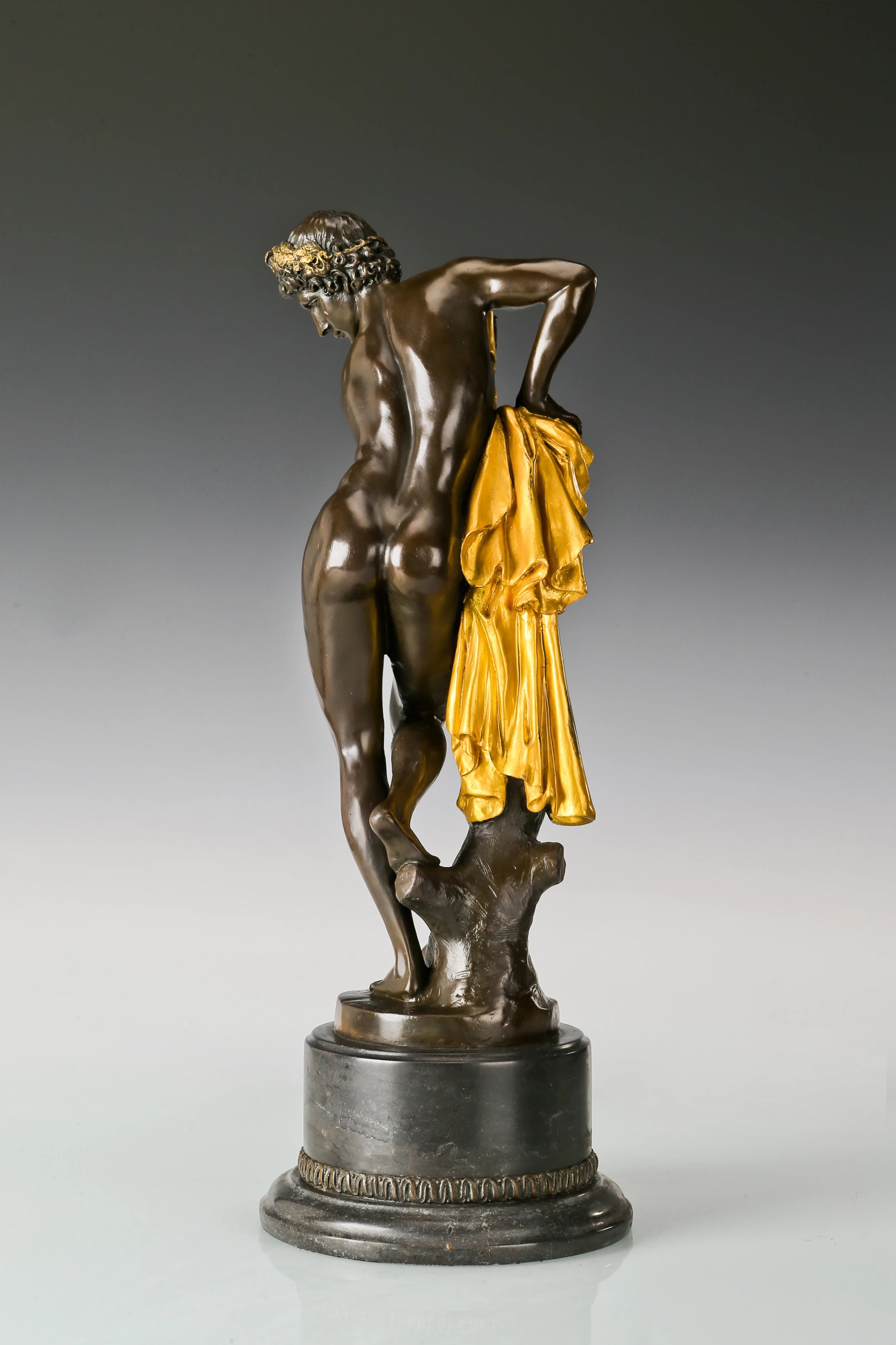 Back view of handcrafted Apollo bronze figure sculpture