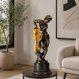Apollo bronze sculpture displayed in an elegant classical interior