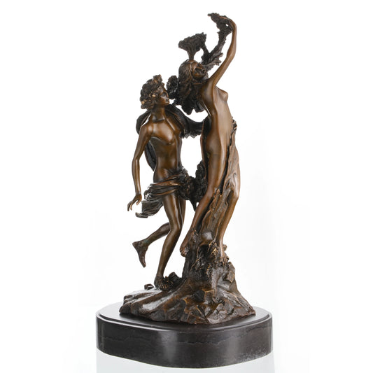 Dramatic bronze sculpture of Apollo and Daphne, capturing the mythological transformation scene. A timeless symbol of love, pursuit, and change—perfect for collectors and luxury interiors.