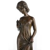 Art Nouveau bronze maiden sculpture with flowing sheer dress on black marble base, romantic bedroom decor art.