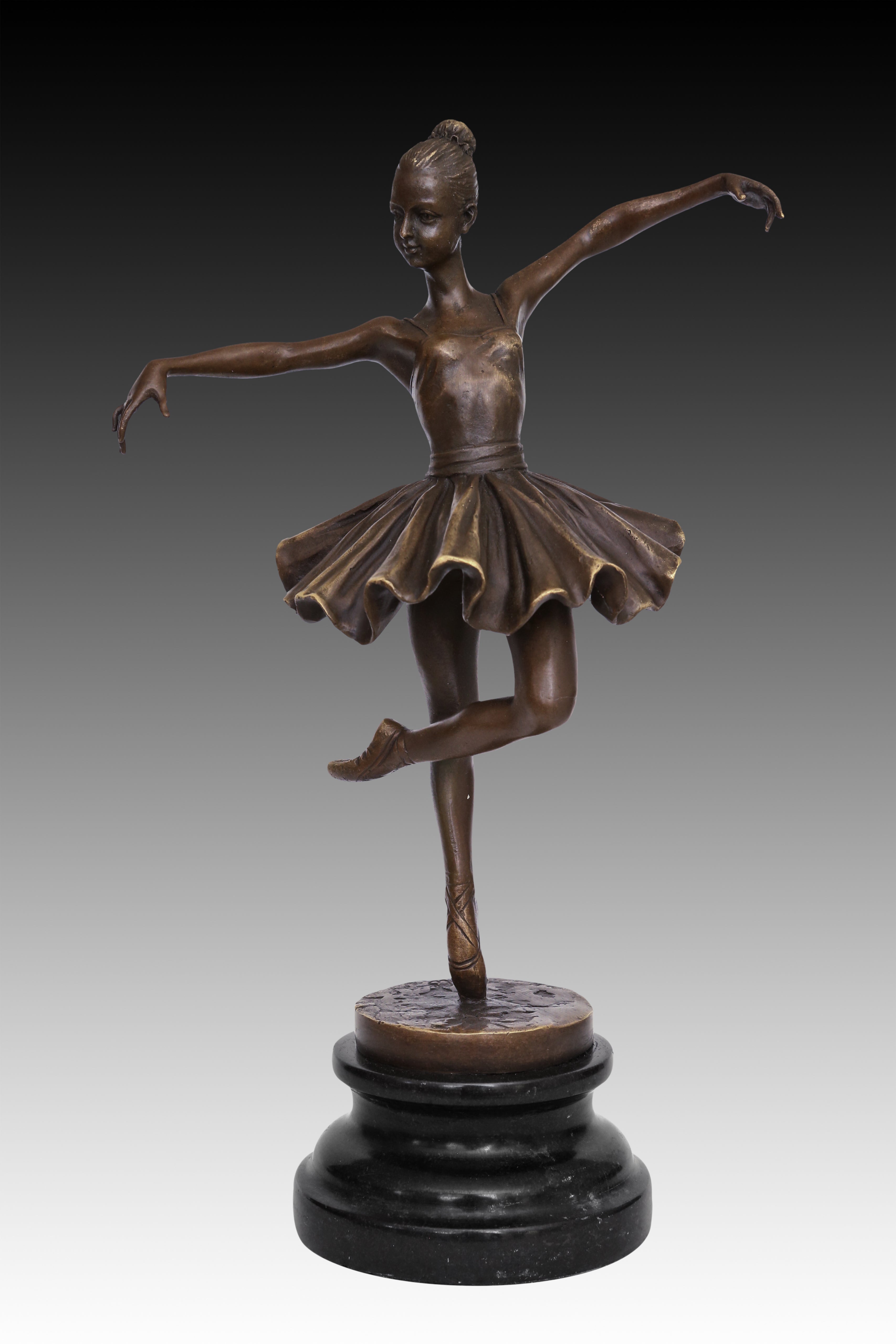 classical balancing ballet dancer bronze statue with raised leg and flowing tutu