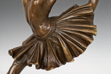 Detailed bronze ballerina tutu with flowing sculpted folds