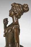 Close-up of ballerina statue holding the edge of her flowing skirt