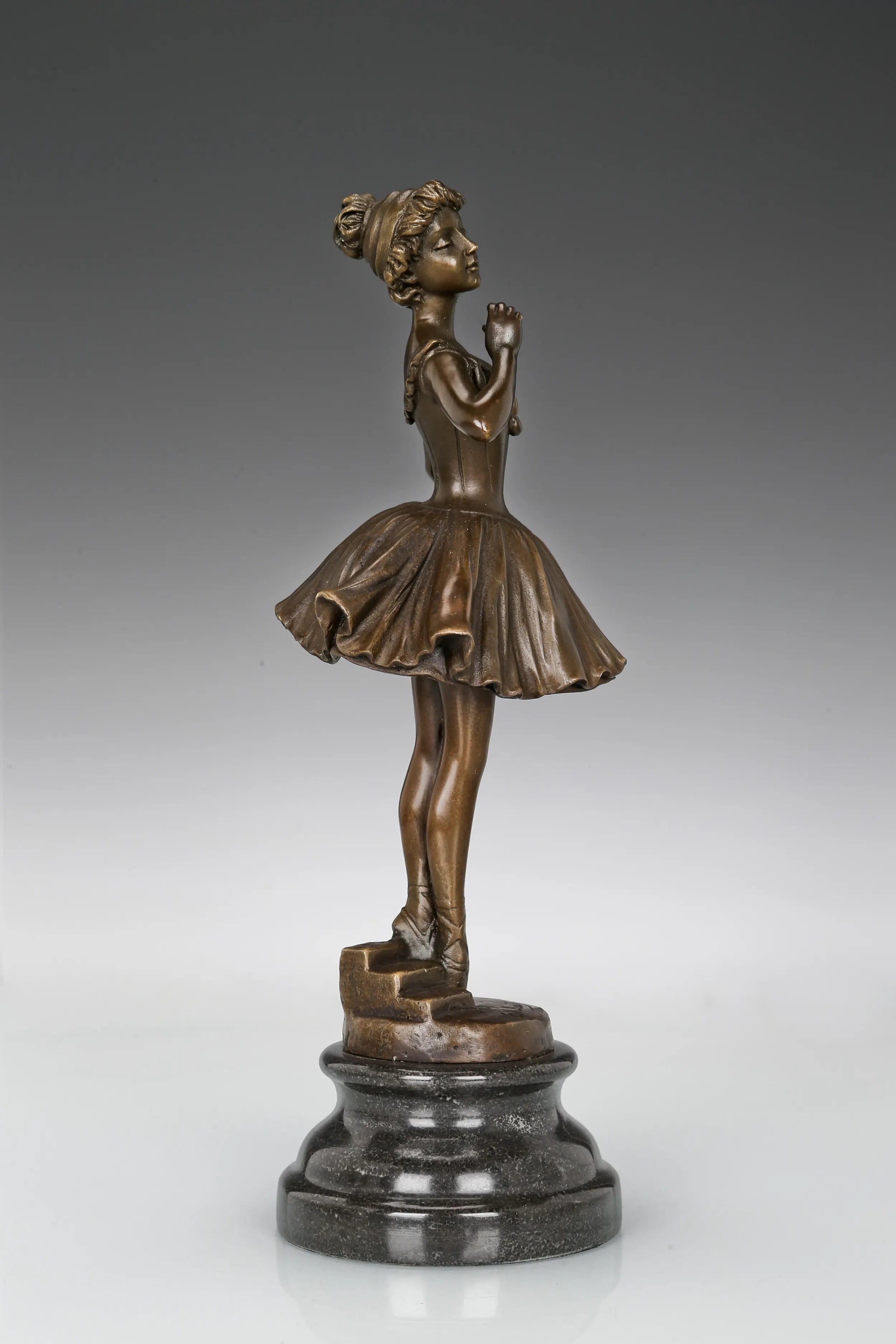 Right side view of handcrafted bronze ballet dancer sculpture