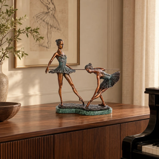 Ballet practice duo bronze sculpture displayed in an elegant home interior