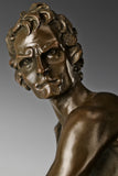 Close-up of David's determined expression and detailed bronze craftsmanship