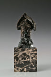 Bronze eagle sculpture ready to fly with wings partially spread and marble base. A powerful symbol of strength, freedom, and ambition.