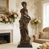 Bronze Bacchante sculpture displayed in a luxury living room as elegant classical home décor