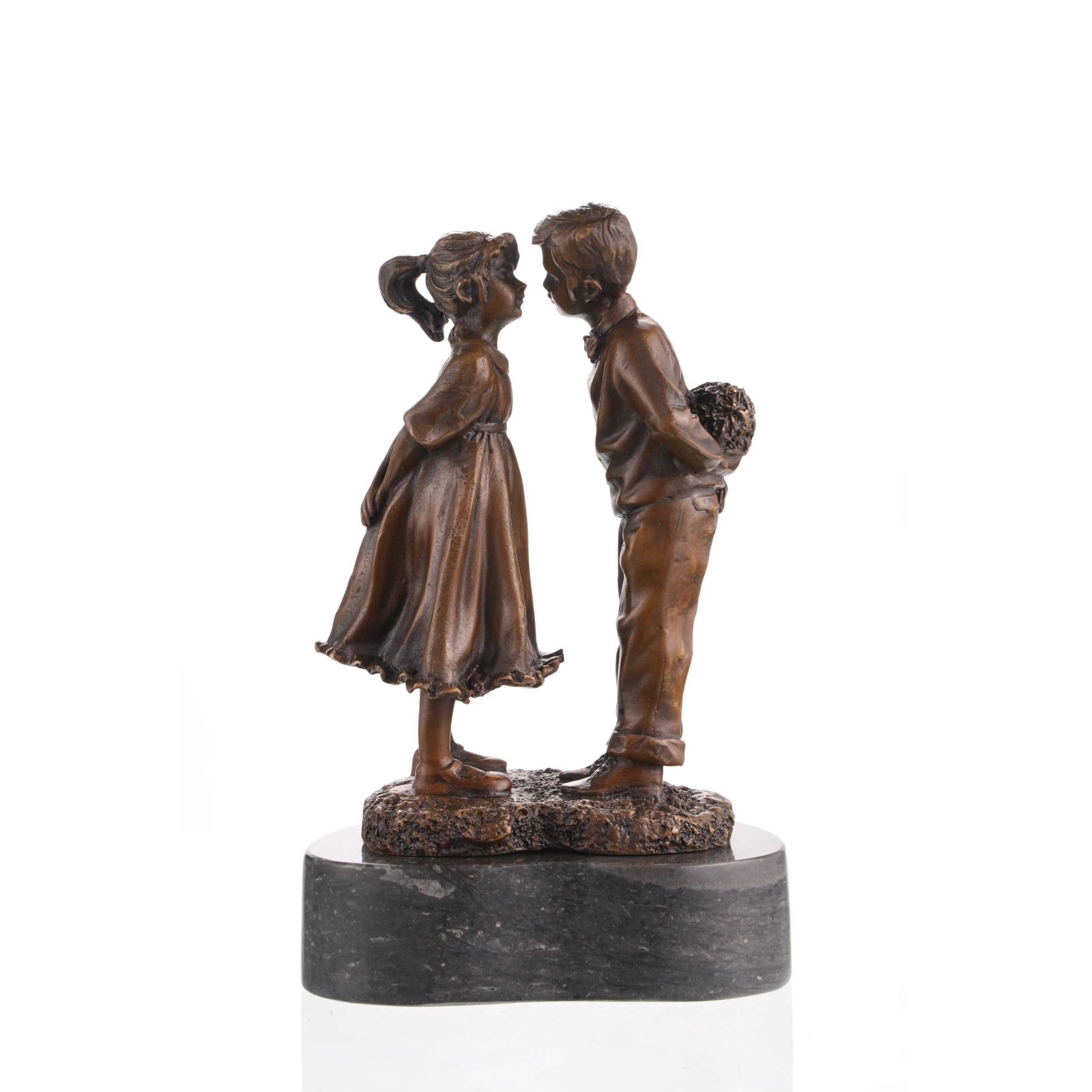 Rear view of a handcrafted bronze boy and girl sculpture with detailed clothing and bouquet.