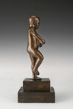 Right side view of expressive bronze child sculpture with dynamic body posture