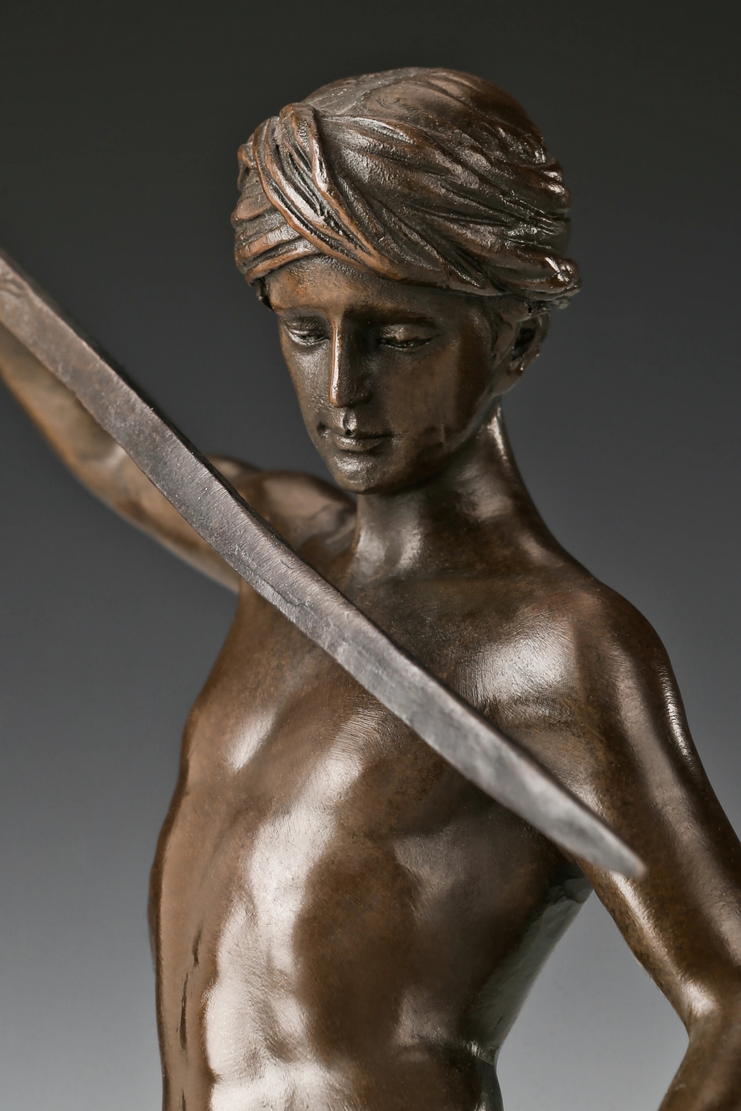 Close-up of David's face on handcrafted bronze biblical sculpture