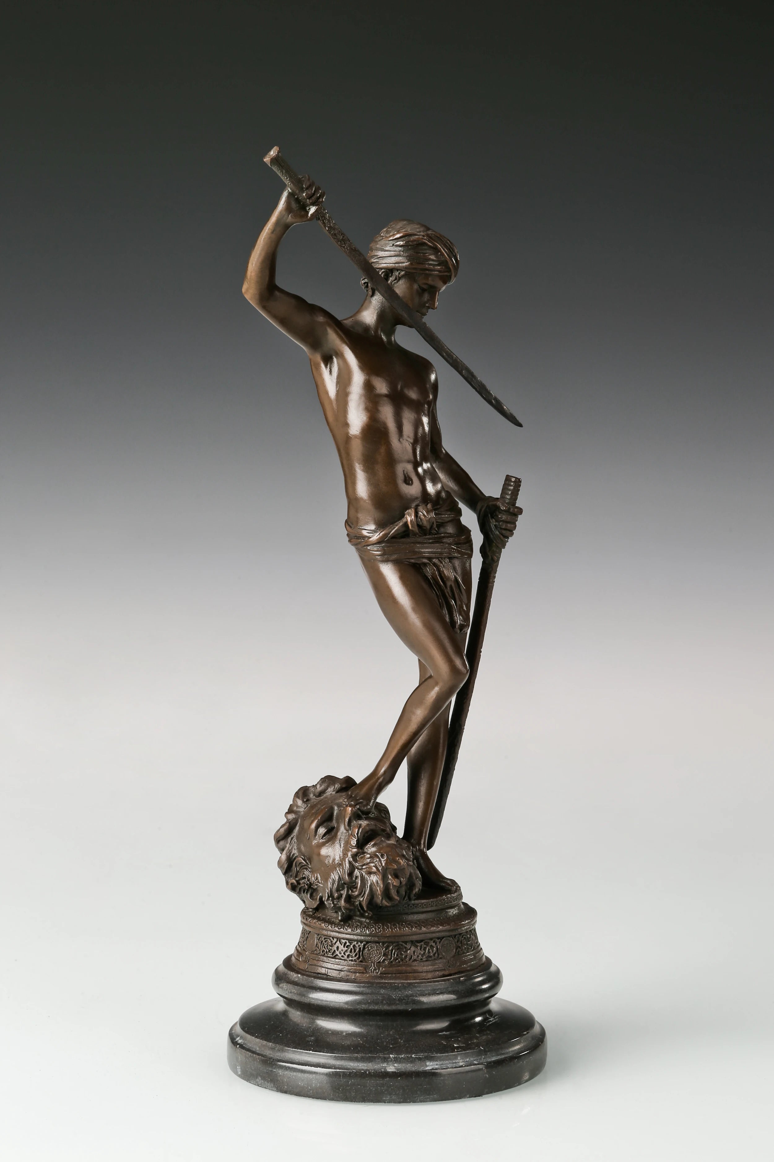 Right side view of handcrafted bronze David hero statue