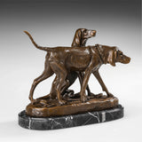 Right side view of handcrafted bronze dog pair statue with warm patina and naturalistic ground