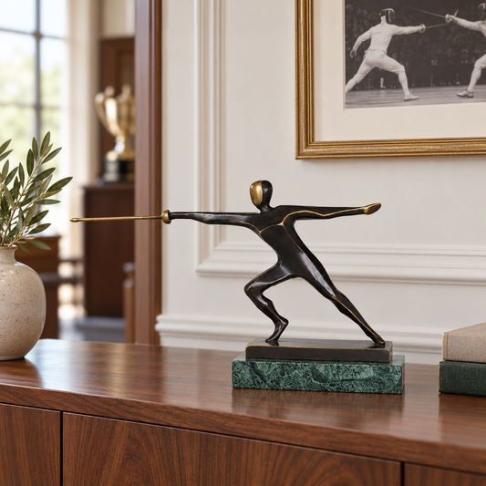 Abstract bronze fencer statue in a lunge pose displayed as modern sports and office decor
