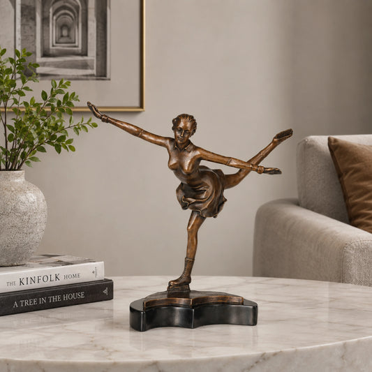 Bronze figure skater sculpture displayed as elegant sports decor in a modern interior