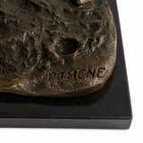 Detail of dark natural marble base supporting the bronze horse and dog sculpture